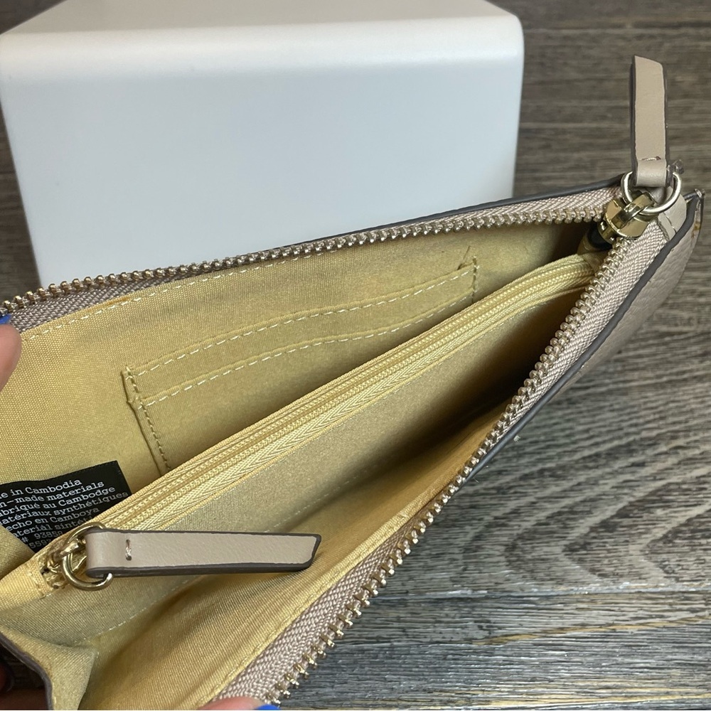 Nanette lepore Tan Clutch with Tassel Accent wristlet. Small flaw on corner - Picture 5 of 9